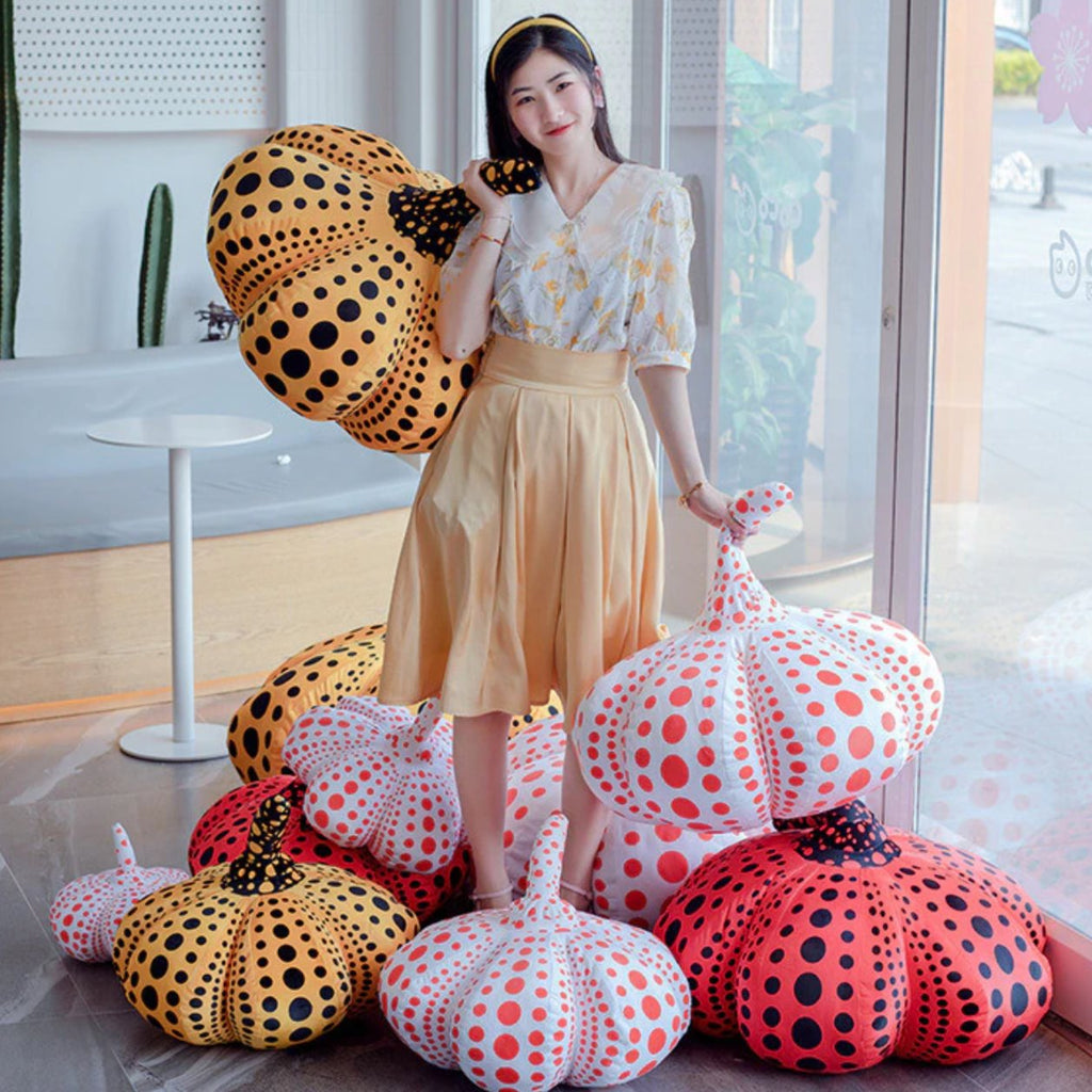 Delightfully Spooky Yayoi Kusama Pumpkin Plushies for Halloween Fun