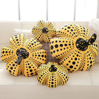 Delightfully Spooky Yayoi Kusama Pumpkin Plushies for Halloween Fun